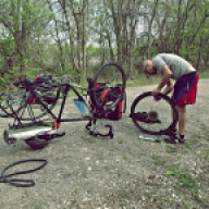 Josh's bike continues to get flats. We are down to our last tube.