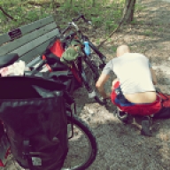 Josh hit his first flat shortly after entering the Katy Trail. This would be the first of many.